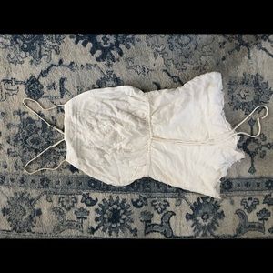 Embroidered linen romper